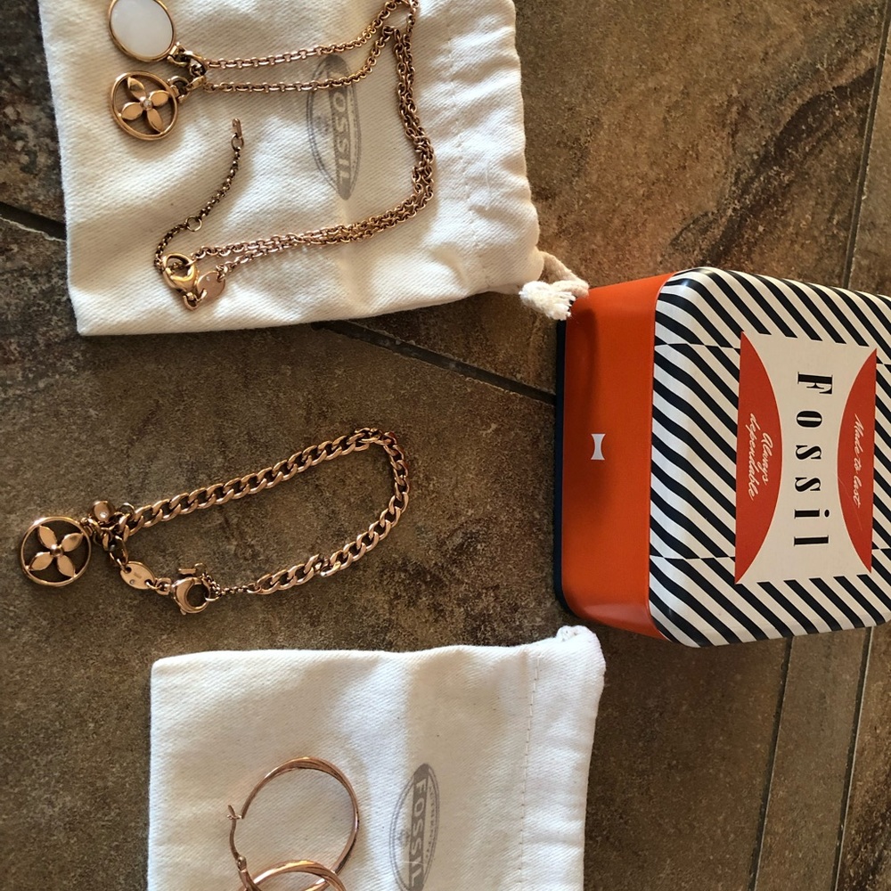 Fossil necklace bracelet and earrings… comes with fossil tin and dust bags
